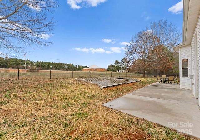 view of yard with a patio and a fenced backyard