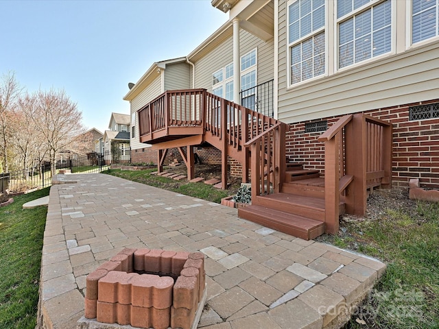 exterior space featuring stairs and fence