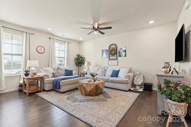 living area with baseboards, dark wood-style flooring, a ceiling fan, and recessed lighting