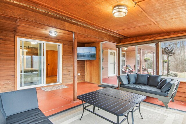 sunroom / solarium with wooden ceiling