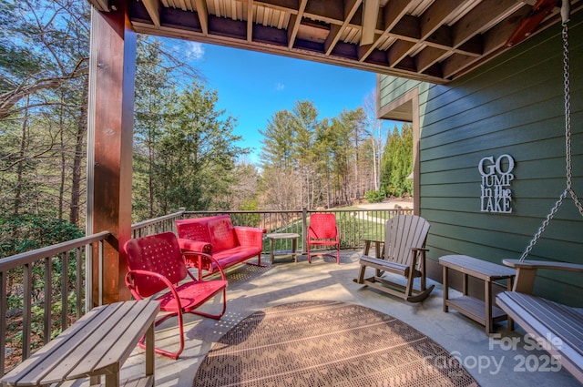 deck featuring outdoor lounge area