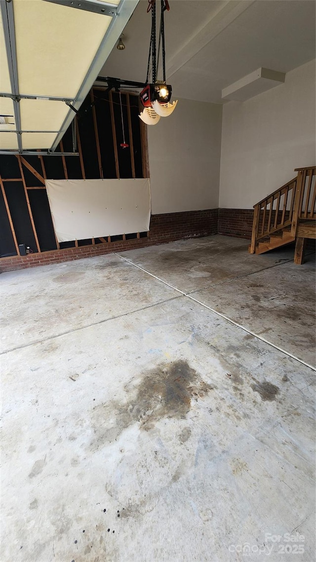 garage featuring a garage door opener