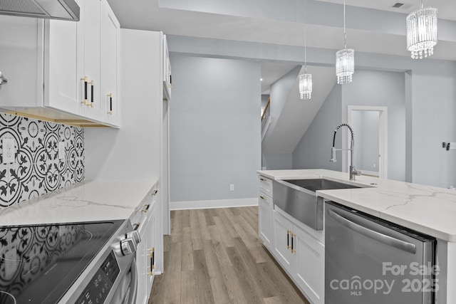 kitchen with extractor fan, stainless steel appliances, a sink, white cabinets, and light wood-type flooring