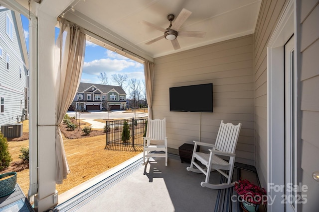 view of patio featuring central air condition unit and ceiling fan