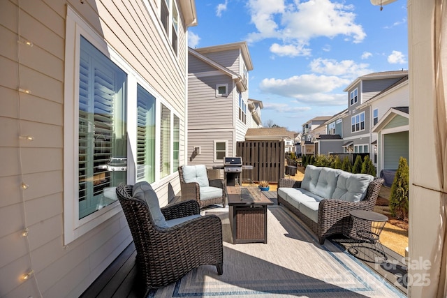 view of patio / terrace featuring a residential view and an outdoor hangout area