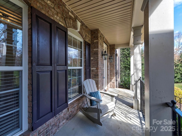 view of patio featuring a porch