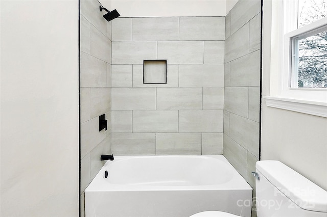 full bath with bathtub / shower combination and toilet