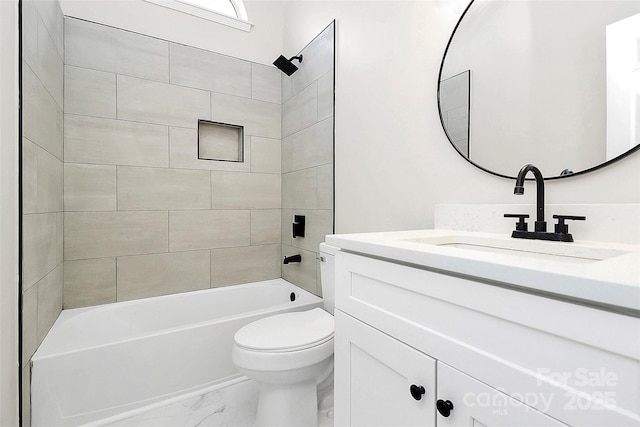 full bathroom featuring marble finish floor, toilet, vanity, and  shower combination