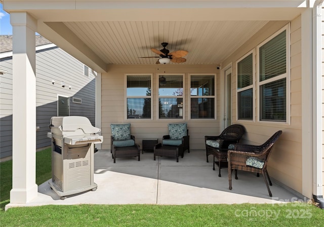 view of patio featuring an outdoor living space, area for grilling, and ceiling fan