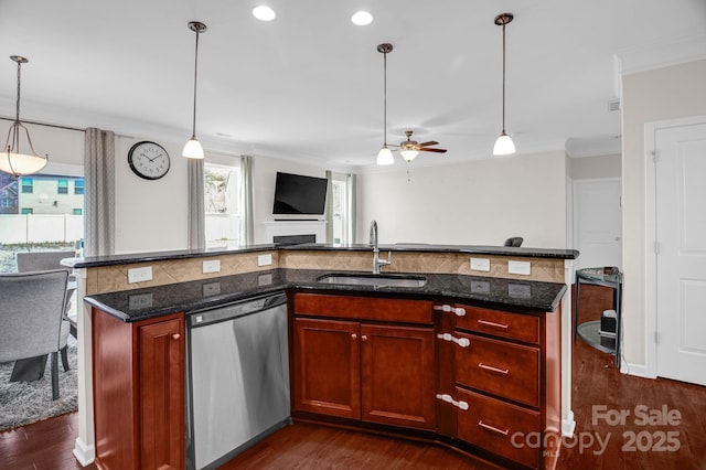 kitchen featuring dishwasher, a healthy amount of sunlight, open floor plan, and a sink