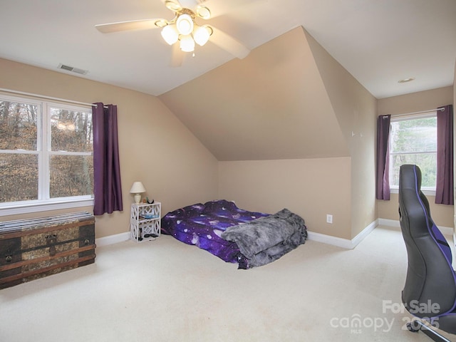 bedroom featuring vaulted ceiling, carpet, visible vents, and baseboards