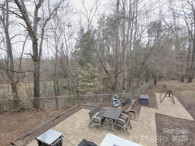 view of patio / terrace featuring outdoor dining area and a fenced backyard