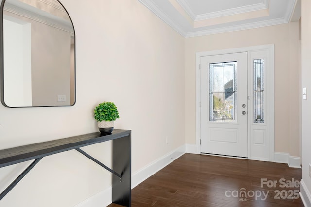 entryway featuring baseboards, dark wood-style floors, and ornamental molding