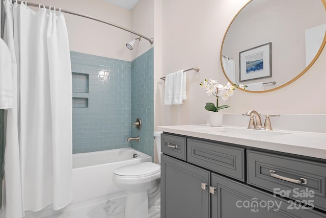 full bathroom featuring vanity, toilet, shower / bath combo, and marble finish floor