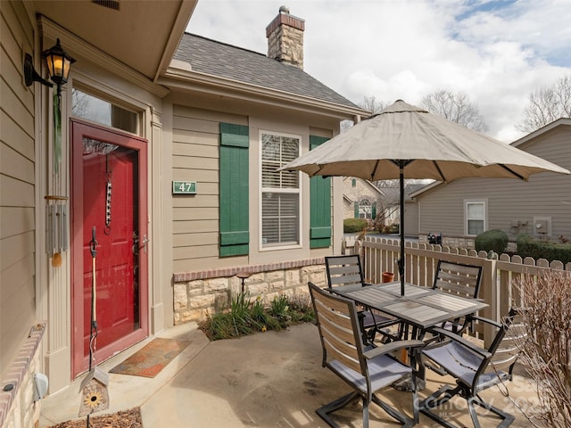 view of patio featuring outdoor dining area