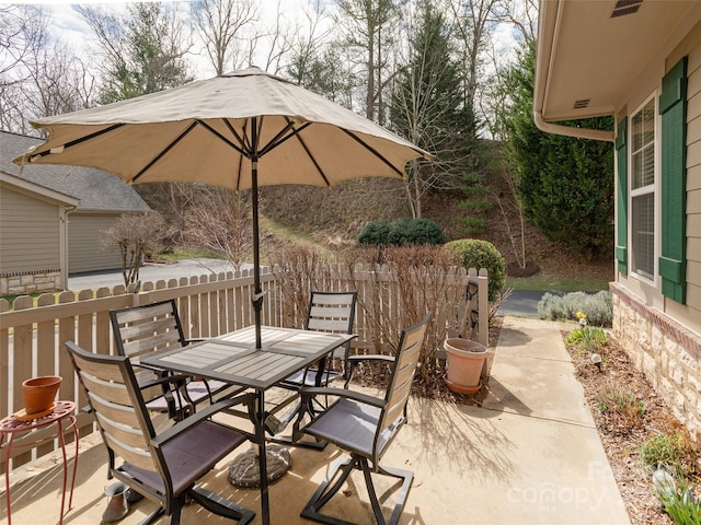 view of patio with outdoor dining area