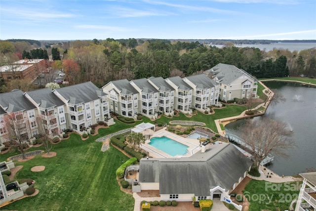 bird's eye view with a water view