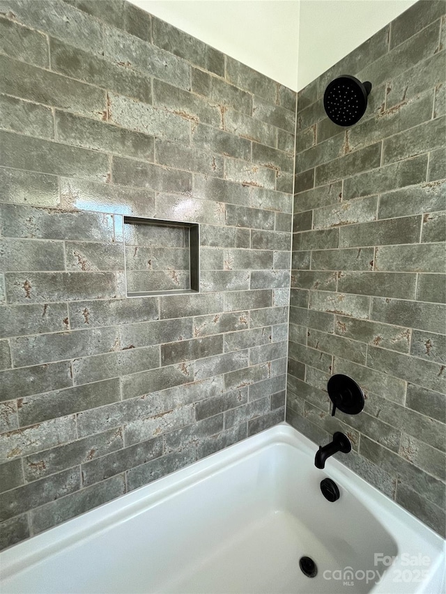 bathroom featuring bathing tub / shower combination