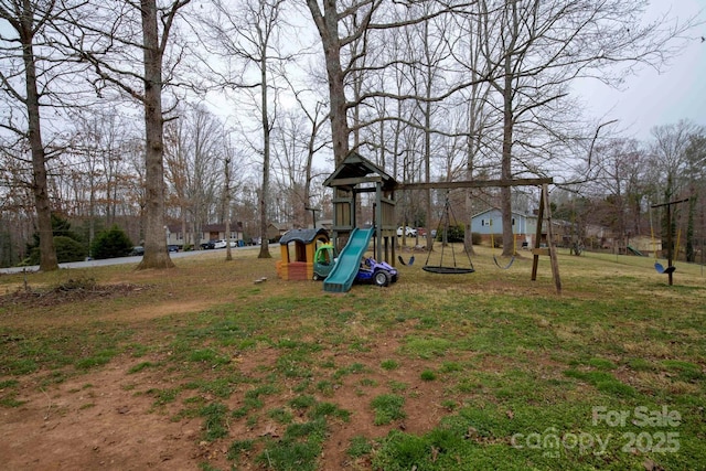 community jungle gym featuring a yard