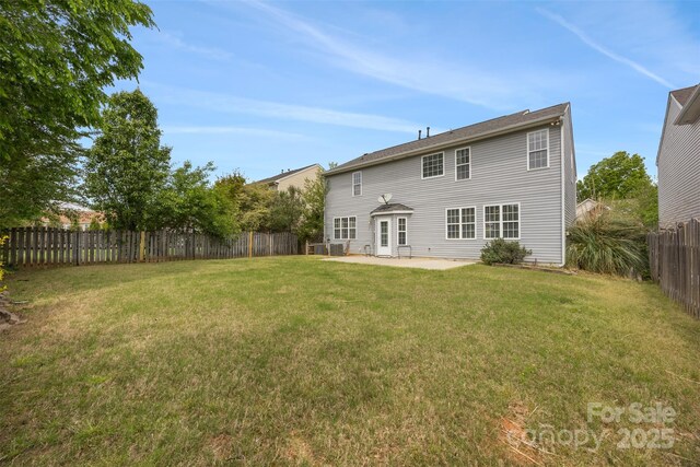 rear view of house featuring a patio