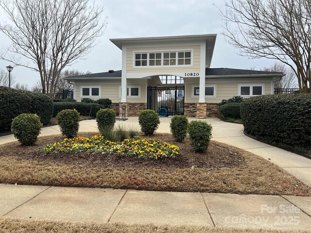view of front of property featuring stone siding