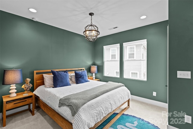 carpeted bedroom with recessed lighting, visible vents, baseboards, and an inviting chandelier