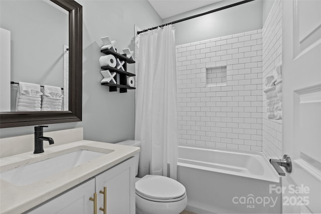 bathroom featuring vanity, toilet, and shower / tub combo with curtain