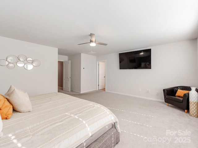 carpeted bedroom featuring ceiling fan and baseboards