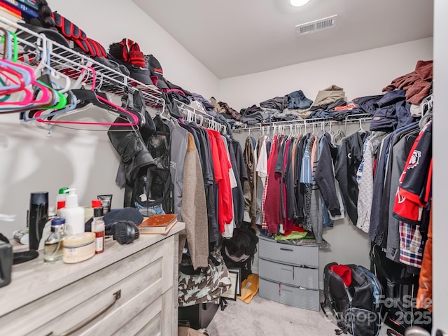 walk in closet with visible vents