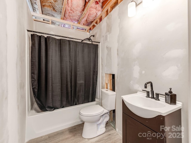 bathroom featuring shower / tub combo, vanity, toilet, and wood finished floors