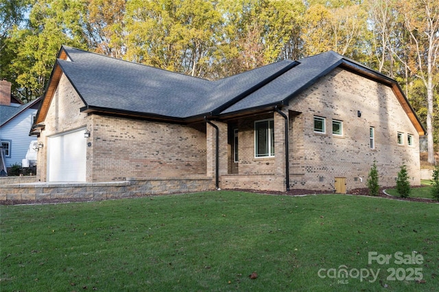 view of front facade featuring brick siding, a shingled roof, crawl space, a garage, and a front lawn