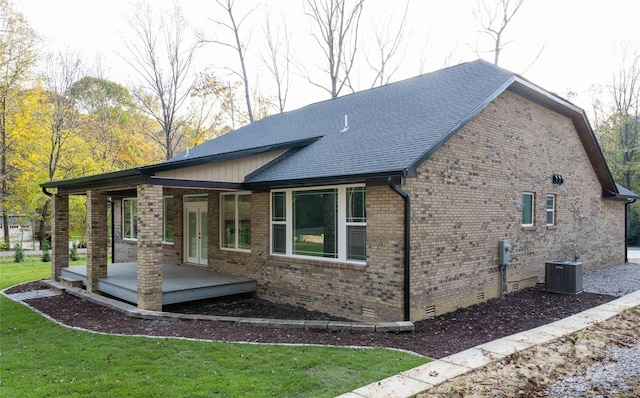 view of property exterior featuring french doors, brick siding, a shingled roof, crawl space, and cooling unit