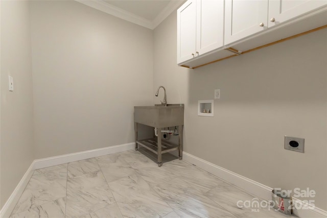 laundry area featuring marble finish floor, crown molding, cabinet space, electric dryer hookup, and baseboards