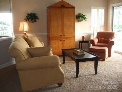 sitting room featuring baseboards