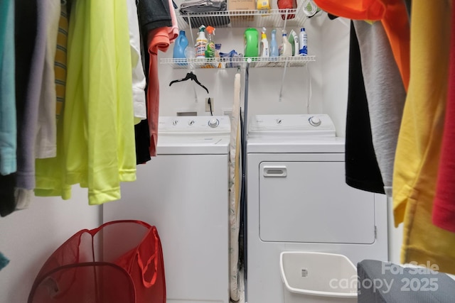 laundry area featuring laundry area and washer and clothes dryer