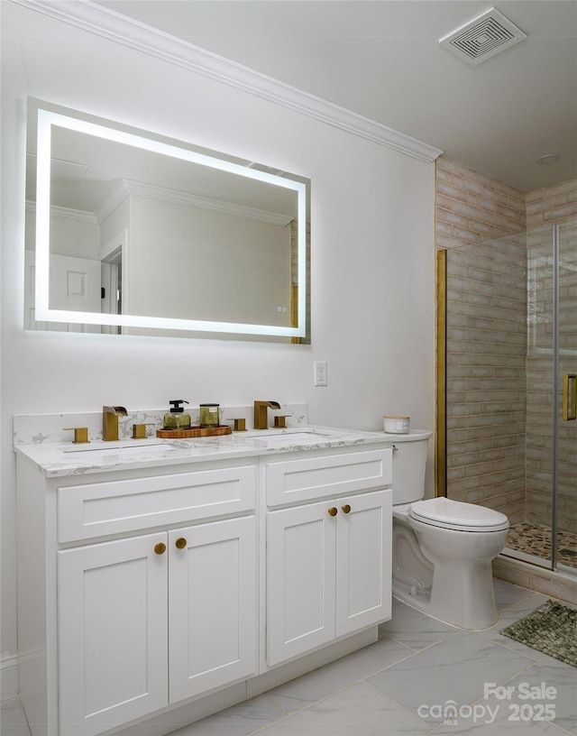 bathroom with marble finish floor, a shower stall, visible vents, and crown molding