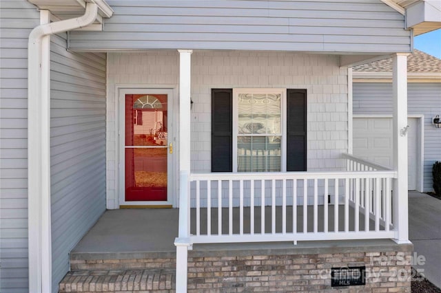 357 Beechnut Dr, Hendersonville, NC 28739 - view of exterior entry with covered porch