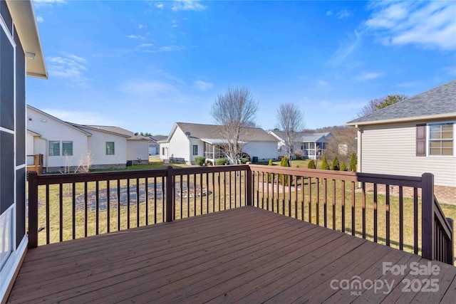 357 Beechnut Dr, Hendersonville, NC 28739 - deck featuring a lawn and a residential view