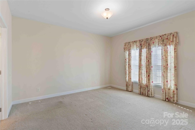 357 Beechnut Dr, Hendersonville, NC 28739 - carpeted empty room featuring visible vents and baseboards