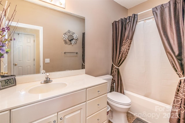 full bath with vanity, toilet, and shower / tub combo with curtain