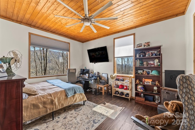 bedroom with hardwood / wood-style floors, wood ceiling, and a ceiling fan