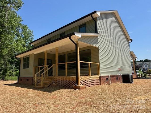 1906 Maius Dr, Conover, NC 28613 - rear view of house with crawl space, covered porch, and central AC