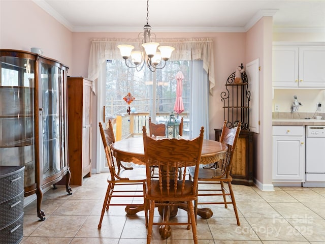 dining room featuring an inviting chandelier, light tile patterned flooring, baseboards, and ornamental molding