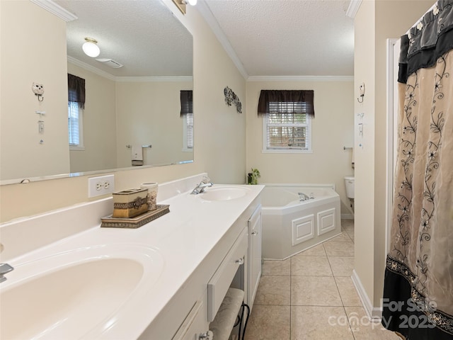 bathroom featuring tile patterned flooring, toilet, crown molding, and a sink