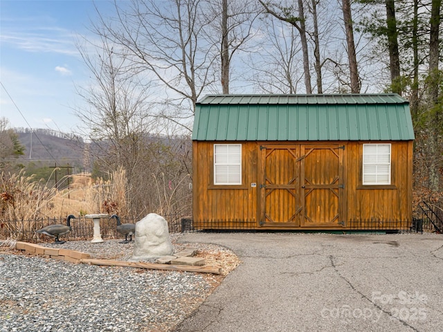 view of shed with a mountain view