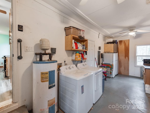 clothes washing area with cabinet space, ceiling fan, washer and clothes dryer, and electric water heater