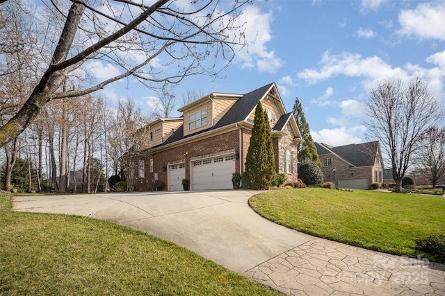 view of side of home featuring brick siding, a yard, an attached garage, and driveway