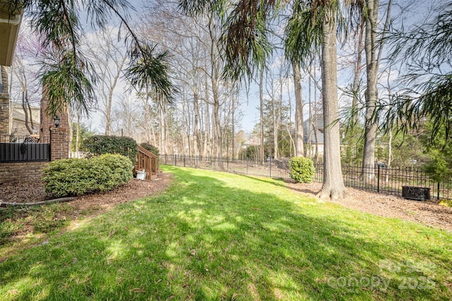 view of yard featuring a fenced backyard