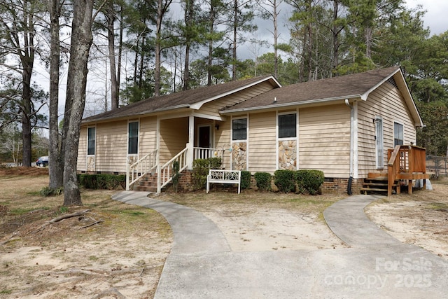 view of front facade featuring crawl space