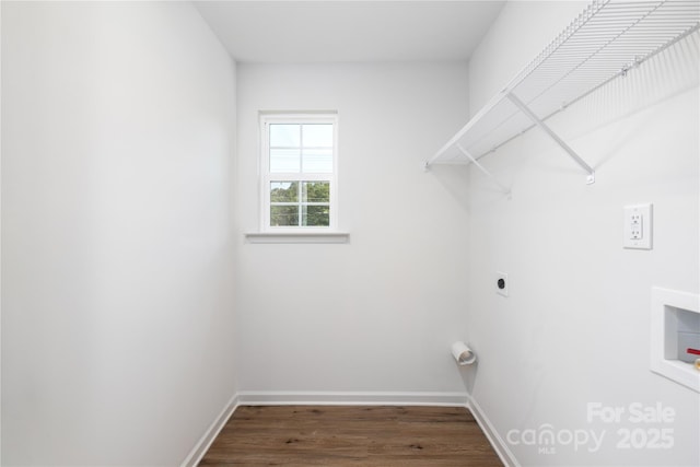washroom featuring baseboards, hookup for a washing machine, wood finished floors, laundry area, and electric dryer hookup